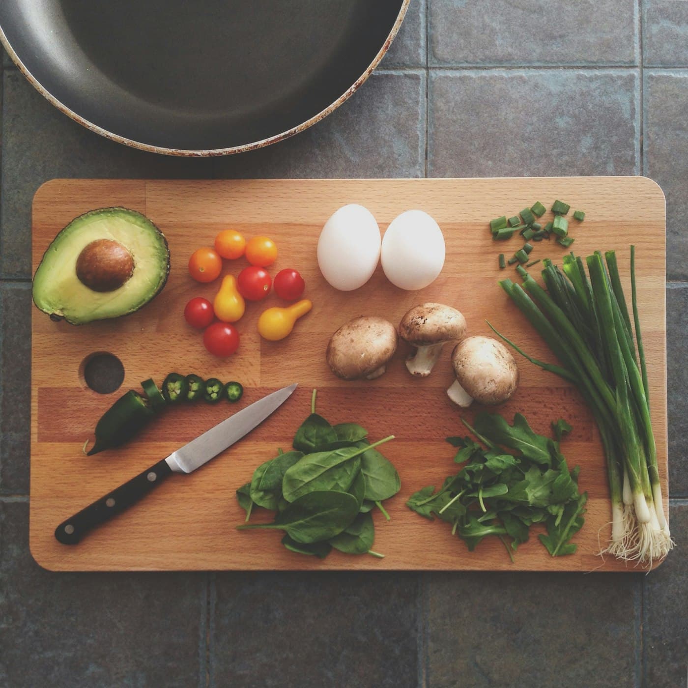 Seasonal vegetables arranged on a wooden board before lunch.