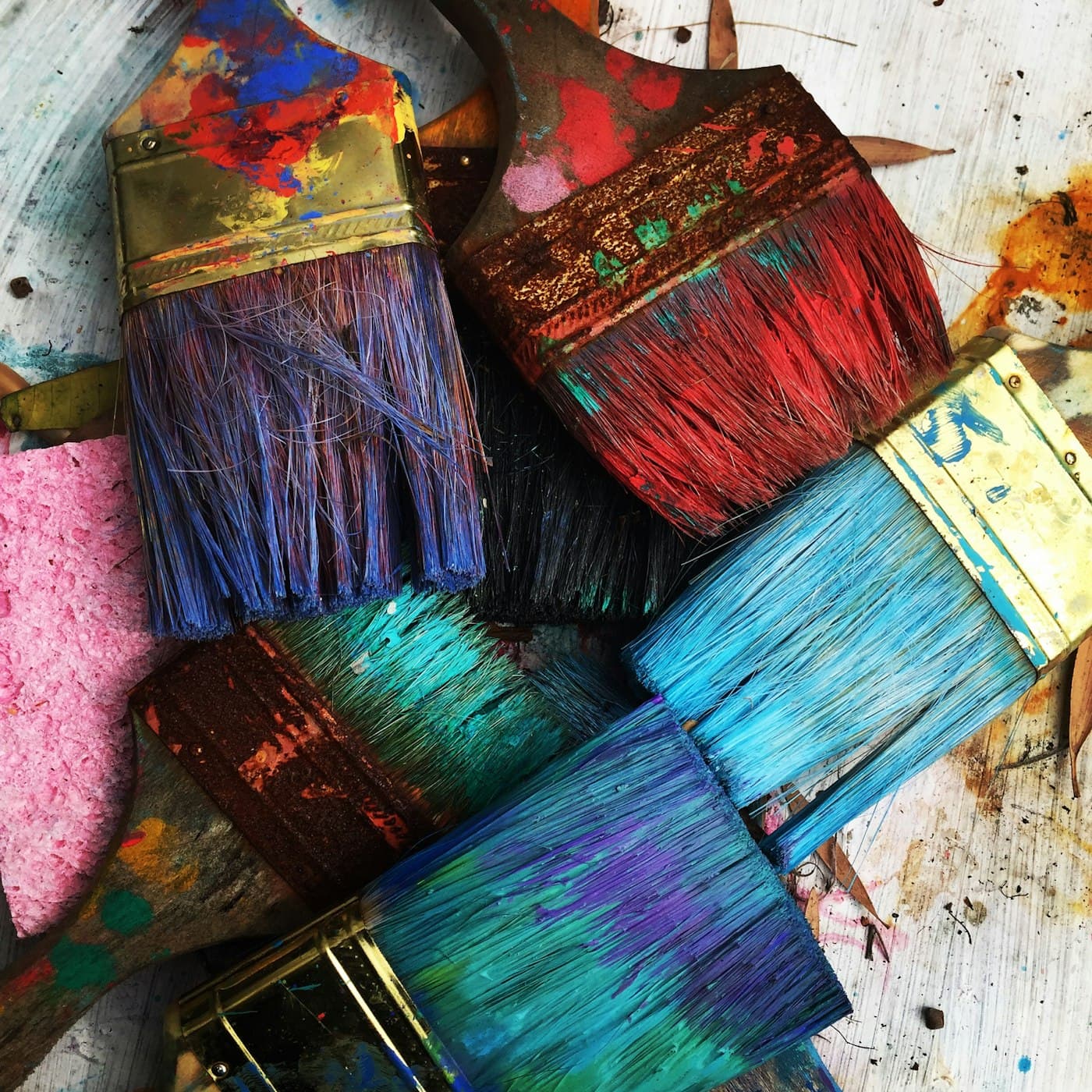 Used brushes and colour laid out after a morning in the light studio.